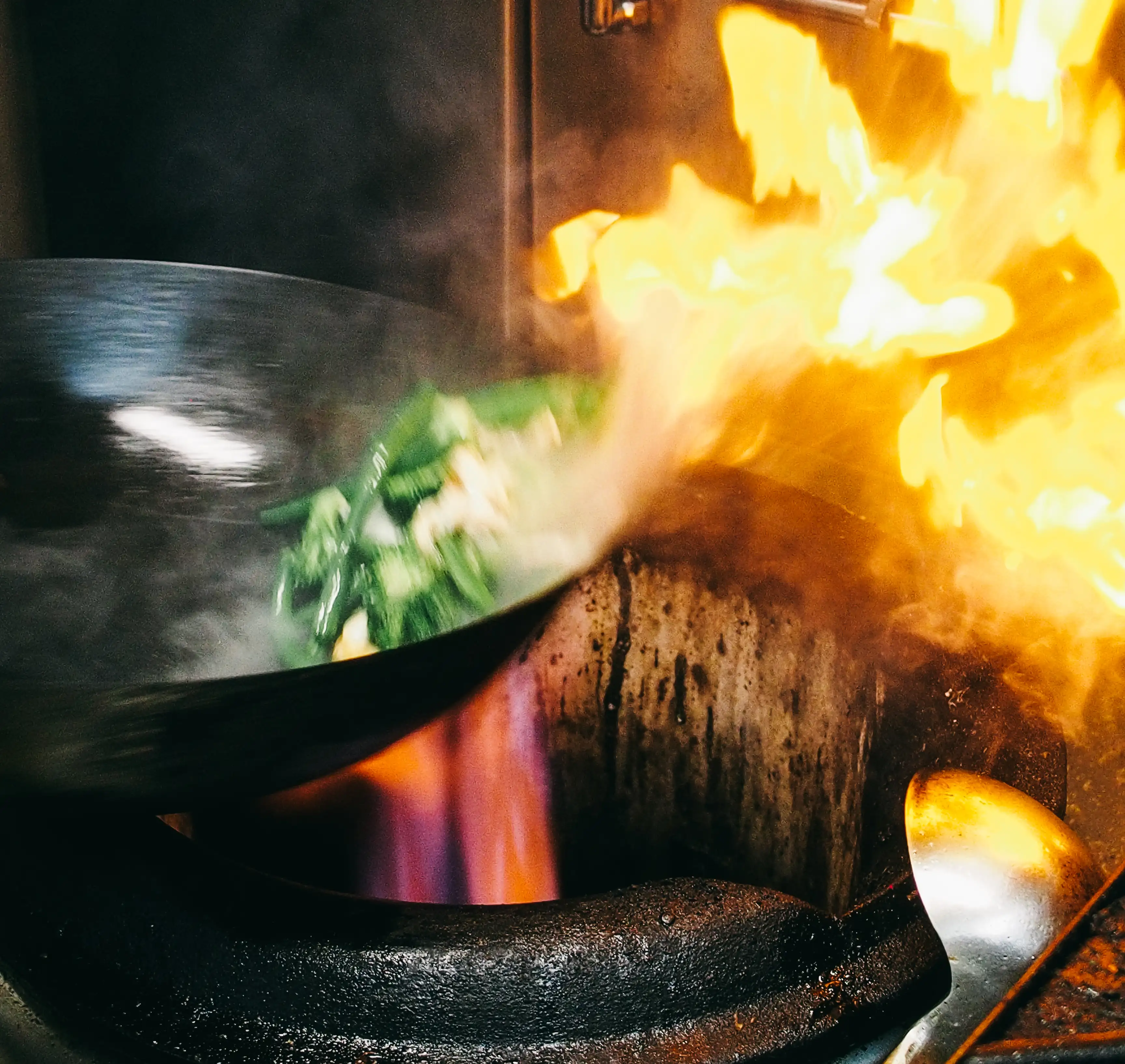 Wok over fire